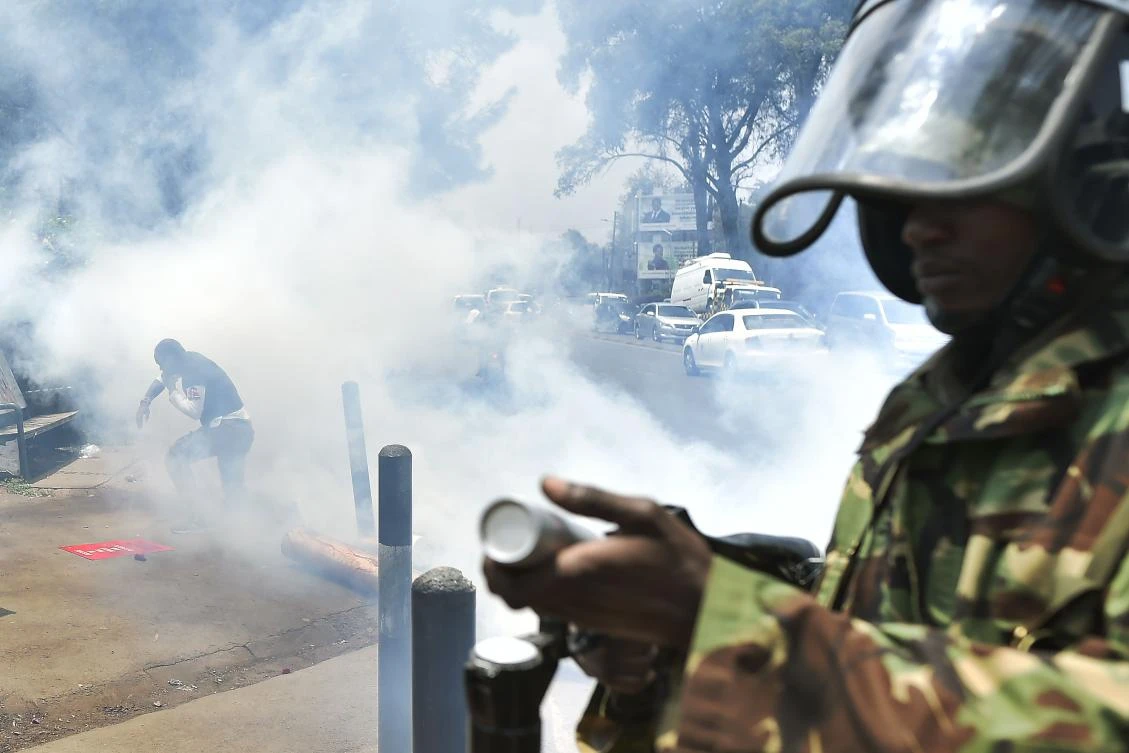 Protesters in Nairobi’s hotspot slums clashed with police who fired tear gas, water cannon and live bullets. (AFP)