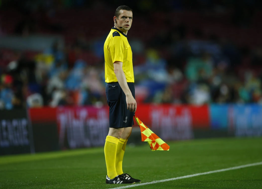 British line referee Douglas Ross looks on the group D Champions League soccer match between FC Barcelona and Olympiakos at the Camp Nou stadium in Barcelona, Spain, Wednesday, Oct. 18, 2017. (AP)