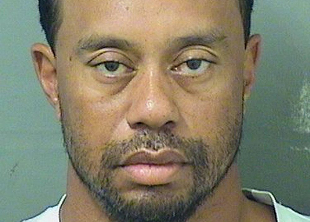 Above, Tiger Woods appears in a booking photo released by Palm Beach County Sheriff’s Office in May 29 in Palm Beach, Florida. (Palm Beach County Sheriff’s Office/Reuters)
