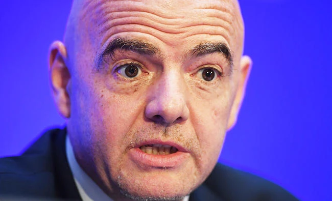 FIFA President Gianni Infantino gestures as he address a press conference following the FIFA Council meeting in Kolkata on Friday. (AFP)