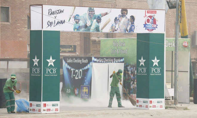 Workers at the venue for the Pakistan-Sri Lanka match to mark the return of international cricket in Pakistan after the deadly terror attack on the Sri Lankan team in 2009. (AN photo)