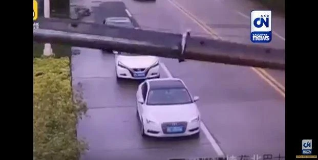 The crane can be seen falling. (YouTube)