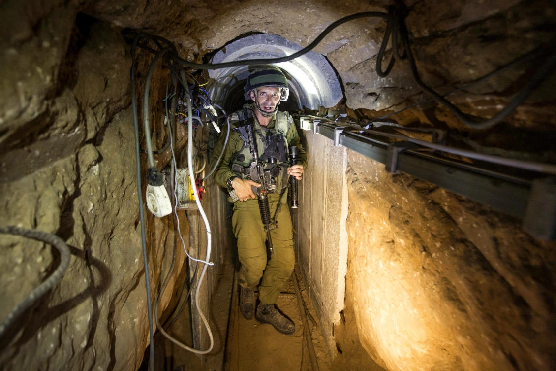 An Israeli soldier in a tunnel used by militants. (AFP)