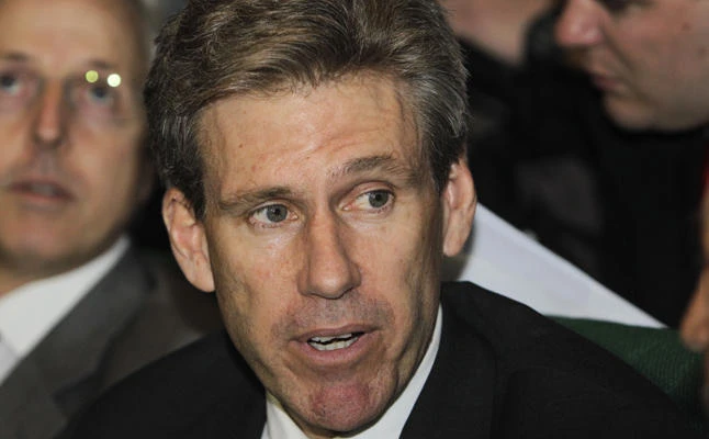 In this April 11, 2011 file photo, then-US envoy Chris Stevens attends meetings at the Tibesty Hotel in Benghazi, Libya. US special operations forces captured a militant in Libya accused of playing an instrumental role in the Benghazi attacks, in which Stevens ended up dead. (AP Photo/Ben Curtis, File)