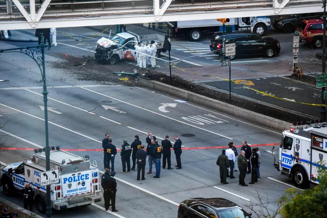 Investigators inspect a truck following a shooting incident in New York on October 31, 2017. (AFP)