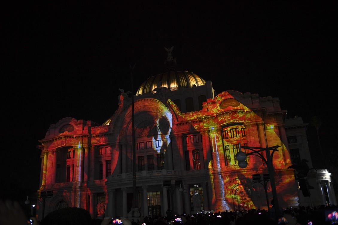 The Palace of Fine Arts is illuminated during a light show as part of the International Festival of Lights (FILUX) in Mexico City, on November 16, 2017. / AFP / PEDRO PARDO