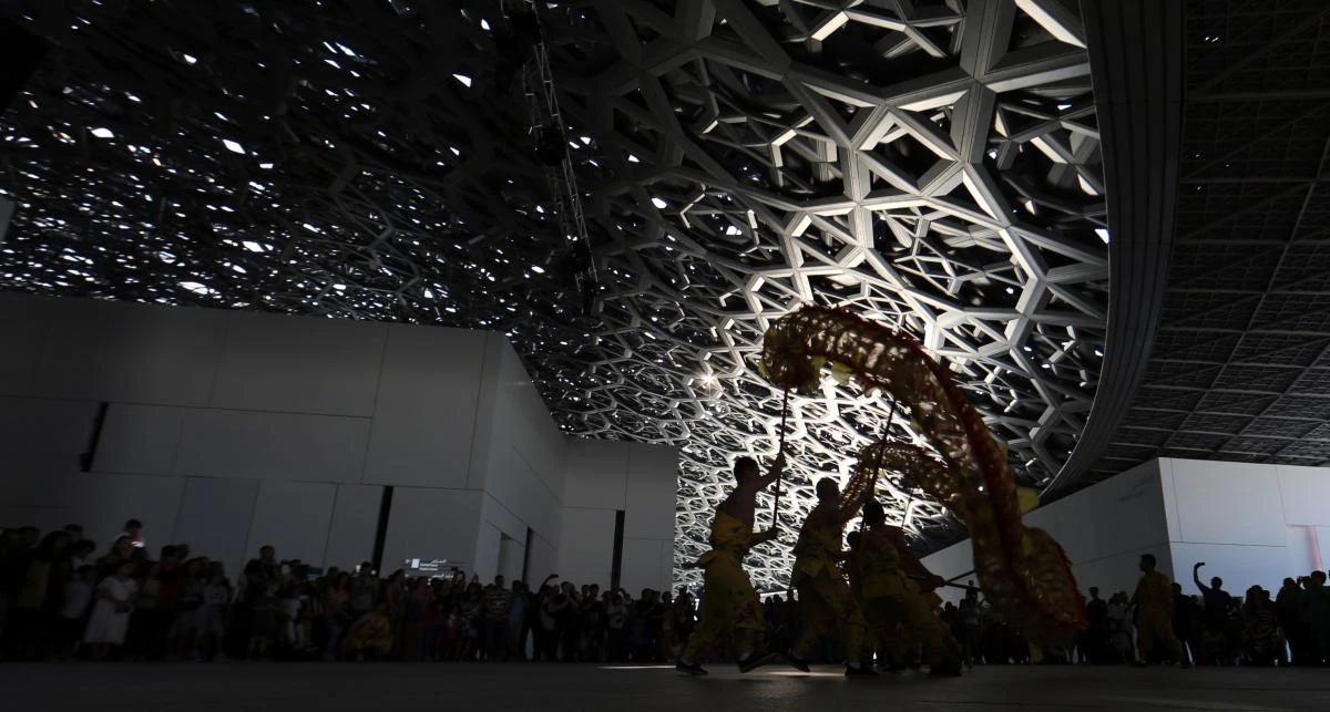Dancers from Korean musical ensemble "Baraji" perform during the opening of the Louvre Abu Dhabi Museum on November 11, 2017 on Saadiyat island in the Emirati capital. / AFP / Karim SAHIB