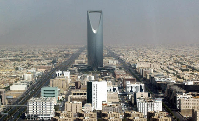 In this Oct. 6, 2003 file photo, Saudi Arabian capital Riyadh with the 'Kingdom Tower' photographed through a window of the 'Al-Faislia Tower' in the Saudi Arabian capital Riyadh. (AP)