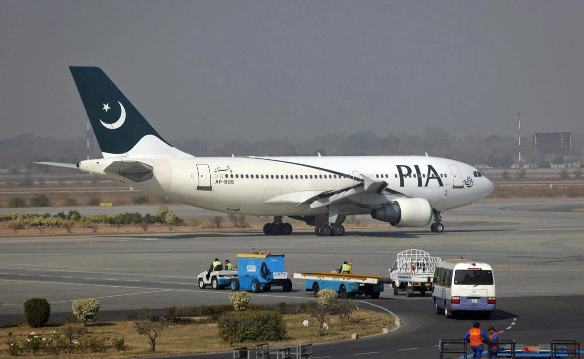 A Pakistan International Airlines (PIA) plane prepares to take-off at Alama Iqbal International Airport in Lahore on February 1, 2012. (File photo by Reuters)