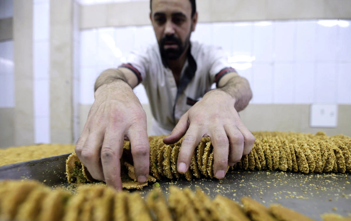 Syria’s famed sweets bringing smiles once again