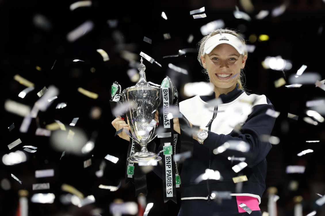 Former world number one Caroline Wozniacki won the WTA Finals in Singapore on Sunday. (AP)