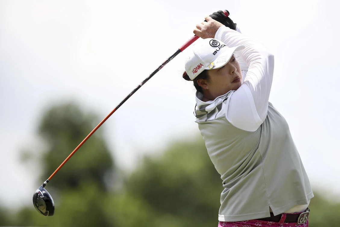 Defending champion Feng Shanshan birdied five of her last seven holes to share a seven-way tie for the lead at the LPGA Japan Classic on Friday. (AP)