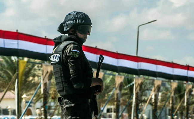 An Egyptian policeman stands guard in the new city of El-Alamien, west of Alexandria. (AFP)