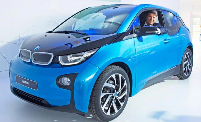 Harald Krueger, CEO of car manufacturer BMW, sits in a BMW i3 car after after it left the assembly line during the production anniversary of the 100,000th electric car at the plant of German luxury automaker BMW AG in Leipzig, Germany, in this Oct. 26, 2017 photo. (AP)