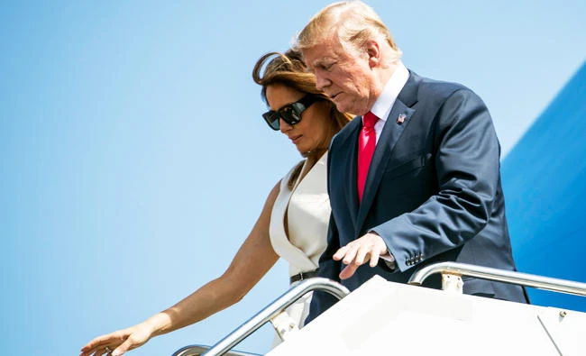President Donald Trump and first lady Melania Trump arrive at Joint Base Pearl Harbor Hickam, Hawaii, on Friday. (AP)