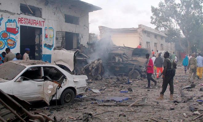 A general view shows the aftermath of a suicide car bomb explosion, at the gate of Naso Hablod Two Hotel in Hamarweyne district of Mogadishu, Somalia on October 28, 2017. The US has ordered all non-essential employees of its mission to Somalia to leave the capital, due to “specific threat information” against them. (Reuters)