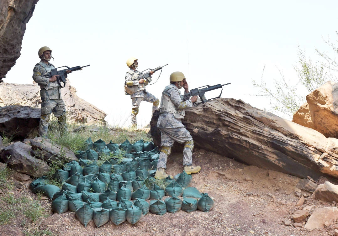 Saudi security forces keep watch along the border with Yemen in the Al-Khubah area in the southern Jazan province. (AFP)