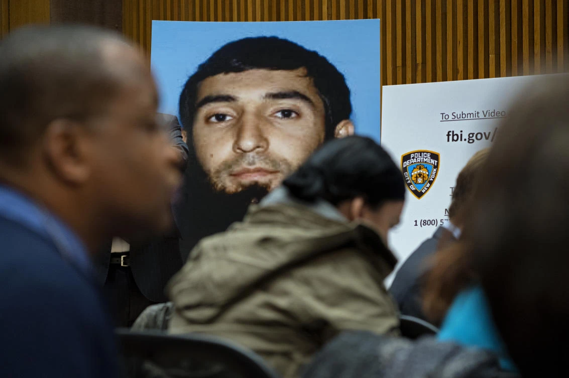 A photo of Sayfullo Saipov is displayed at a news conference at One Police Plaza Wednesday, Nov. 1, 2017, in New York. Saipov is accused of driving a truck on a bike path that killed several and injured others Tuesday near One World Trade Center. (AP)