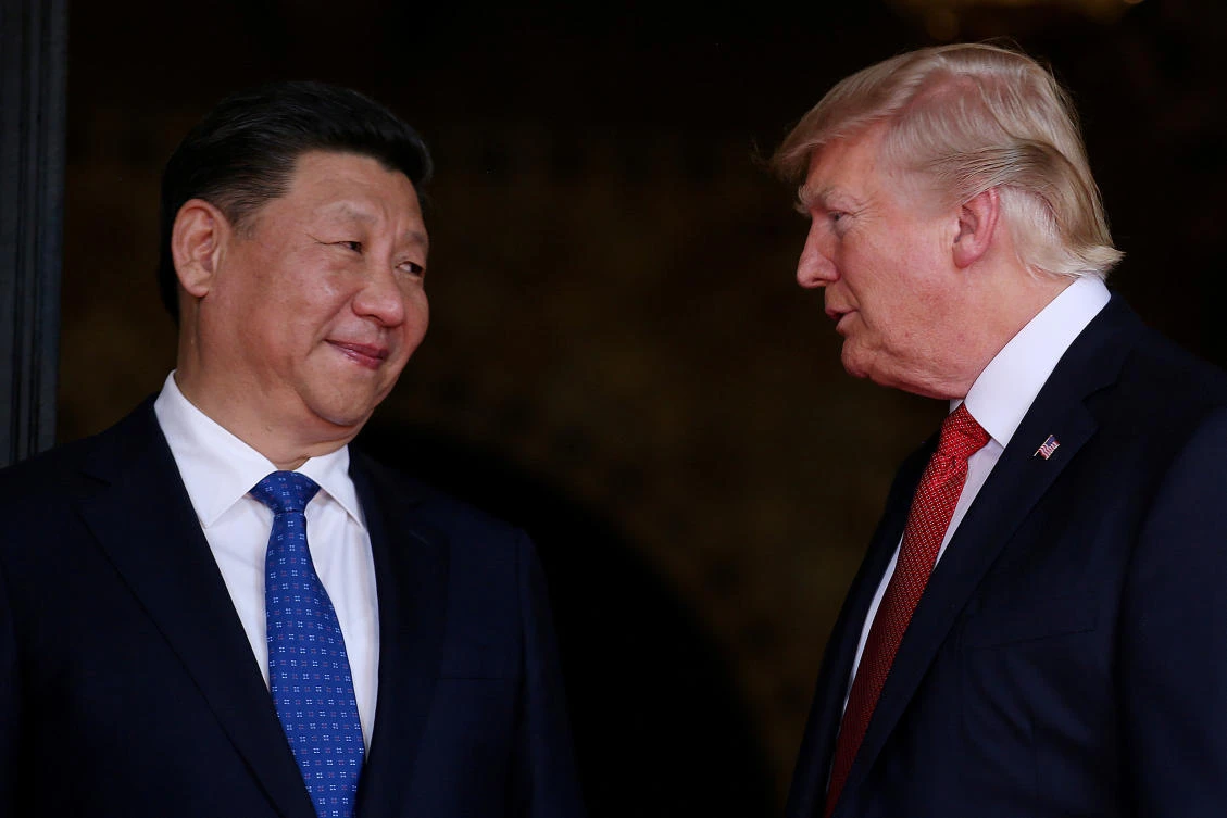 US President Donald Trump welcomes Chinese President Xi Jinping at Mar-a-Lago state in Palm Beach in Florida last April. Trump’s will visit China starting on Wednesday as part of his Asian tour. (Reuters)
