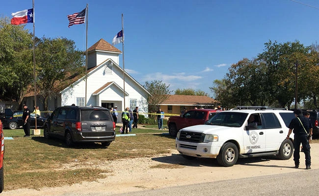 Emergency personnel respond to a fatal shooting at a Baptist church in Sutherland Springs, Texas, on Sunday, Nov. 5, 2017. (KSAT via AP)
