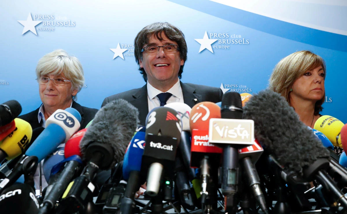 Sacked Catalan leader Carles Puigdemont and former members of the Government of Catalonia Clara Ponsati and Meritxell Borras attend a news conference at the Press Club Brussels Europe in Brussels, Belgium on October 31, 2017. (File photo by Reuters)
