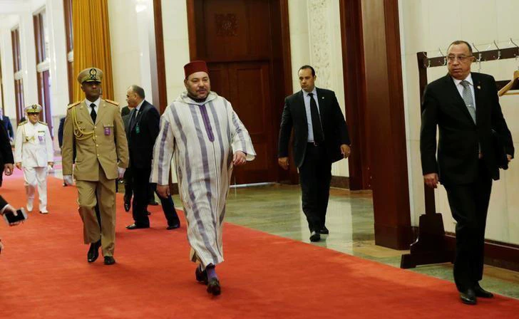 Moroccan King, Mohammed VI, center, arrives at the Great Hall of People for a meeting with China’s Premier Li Keqiang (not in picture) in Beijing, China on May 12, 2016. (File photo by Reuters)
