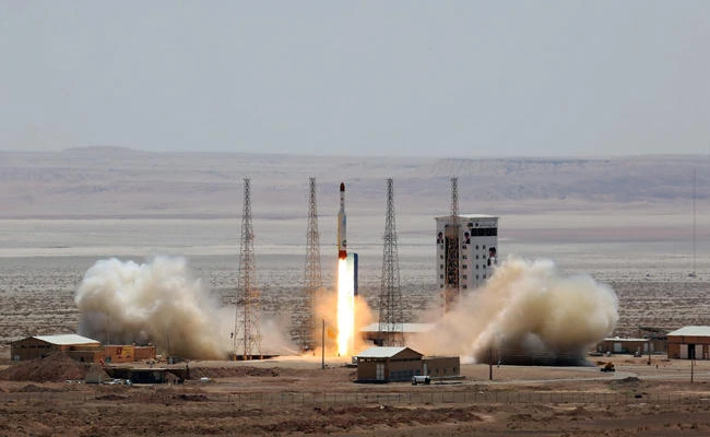 A handout picture released by Iran's Defense Ministry on July 27, 2017 shows a Simorgh (Phoenix) satellite rocket at its launch site at an undisclosed location in Iran. The United States on Tuesday accused Iran of supplying a missile to Yemeni rebels that was fired into Saudi Arabia in July 2017. (AFP)