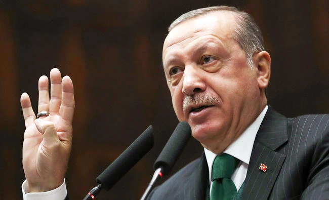 Turkey's President Recep Tayyip Erdogan addresses members of parliament of the ruling Justice and Development Party (AKP) in Ankara on Tuesday. (AFP)