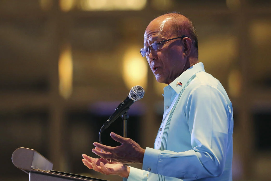 Philippine Secretary of National Defense Delfin Lorenzana gestures during a conference on “ASEAN Leadership amid a New World Order” at the financial district of Makati, metropolitan Manila, Philippines Wednesday, Nov. 8, 2017. Lorenzana says Philippine President Rodrigo Duterte has stopped construction work on a newly formed sandbar in the disputed South China Sea after a protest from Beijing. (AP/Aaron Favila)
