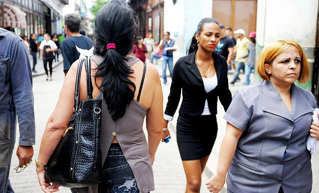 Cubans walks along a street of Havana, in this October 27, 2017 photo. (AFP)