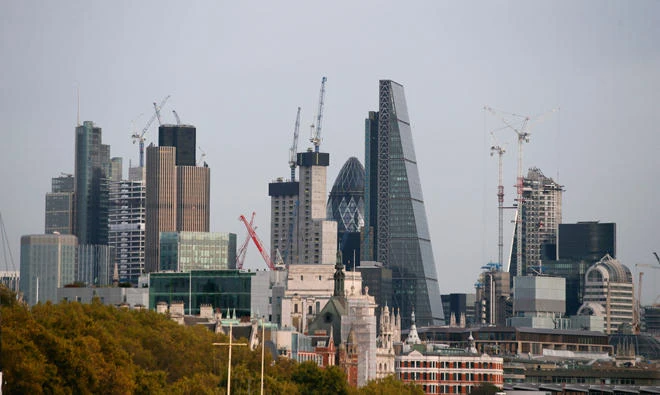 The skyline of the City of London is seen on November 1, 2017. The Bank of England, on guard against soaring Brexit-fuelled inflation, is on the precipice of lifting its key interest rate November 2 for the first time since 2007, according to analysts. (AFP / Daniel Leal-Olivas)