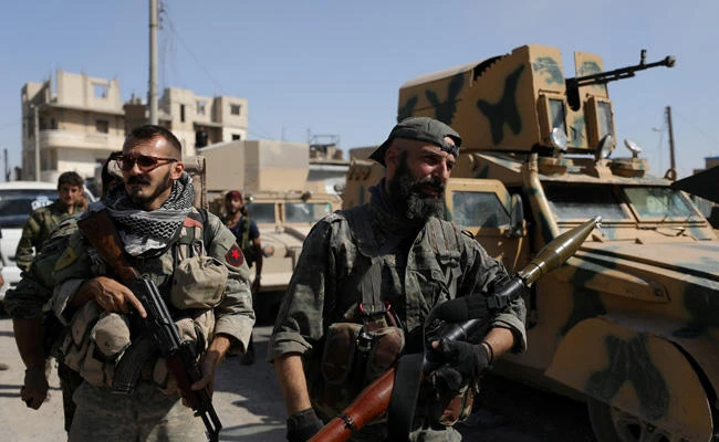 Syrian Democratic Forces (SDF) fighters are seen in Raqqa, Syria, on October 16, 2017. (REUTERS/Rodi Said/File Photo)