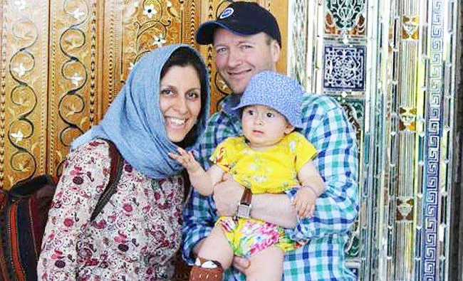 Iranian-British aid worker Nazanin Zaghari-Ratcliffe is seen with her husband Richard Ratcliffe and her daughter Gabriella in an undated photo handed out by her family. (Reuters)