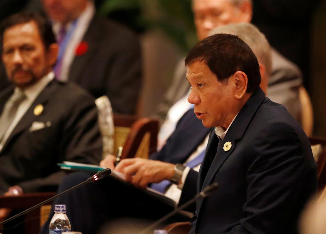 Philippines’ President Rodrigo Duterte speaks next to Brunei’s Sultan Hassanal Bolkiah during the APEC-ASEAN dialogue, on the sidelines of the APEC summit, in Danang, Vietnam on November 10. (Reuters)