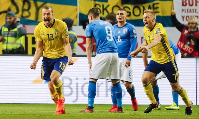 Sweden’s Jacob Johansson celebrates scoring the winner against Italy. (AP)