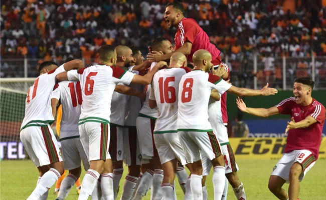 Morocco's team players celebrate a goal at the Felix Houphouet-Boigny stadium in Abidjan on Saturday, November 11, 2017, during the FIFA World Cup 2018 Africa Group C qualifying football match between Ivory Coast and Morocco. ( AFP / ISSOUF SANOGO)