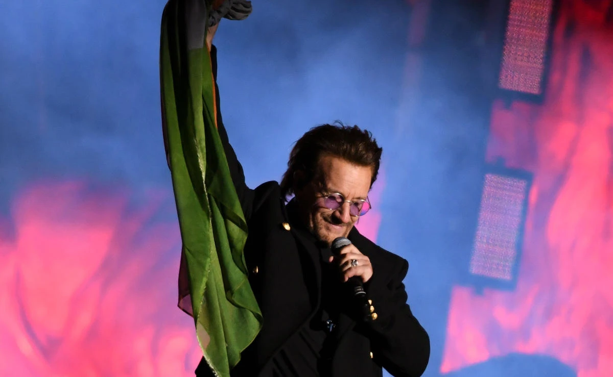 Bono of Irish rock band U2 performs with his band on stage in Trafalgar Square in central London on November 11, 2017. (AFP)