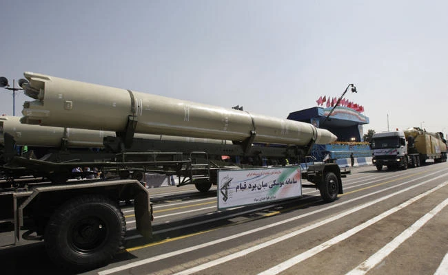 In this Sept. 21, 2012 file photo, a Qiam missile is displayed by Iran's Revolutionary Guard during a military parade outside Tehran. Saudi Arabia and the US now accuse Iran of supplying ballistic missiles to Houthi insurgents in Yemen, including this model. (AP Photo/Vahid Salemi, File)