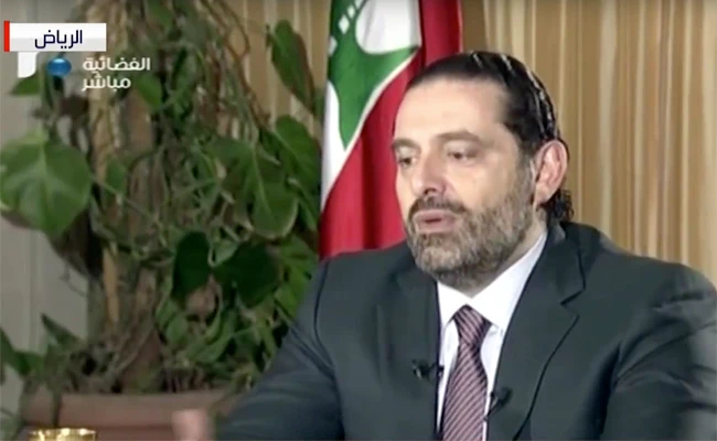 Hariri says Iran to blame for Lebanon crisis, promises to return to his country 'very soon'