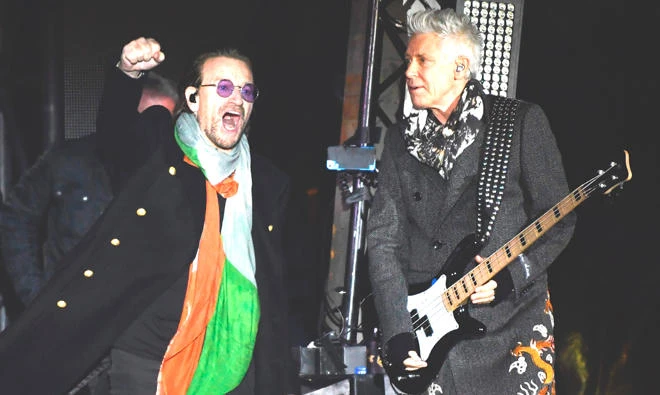 Bono and Adam Clayton of Irish rock band U2 perform in Trafalgar Square in central London on Saturday. (AFP)