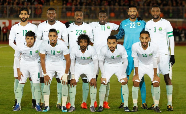 Saudi Arabia team line up before their recent match against Portugal. (Reuters)
