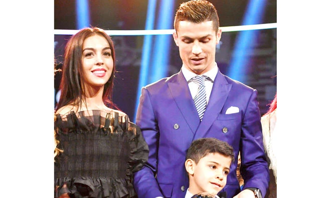 Cristiano Ronaldo with partner Georgina Rodriguez and his son Cristiano Ronaldo Jr. (AFP)