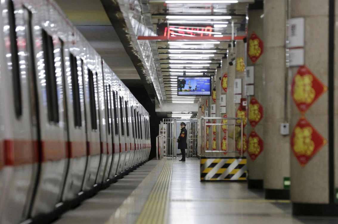 Above, a train platform inside a station on the Subway Line Number 1 in Beijing. China has been in the grips of a metro-building binge with more than 50 cities working on over 1 trillion yuan worth of projects. (Reuters)