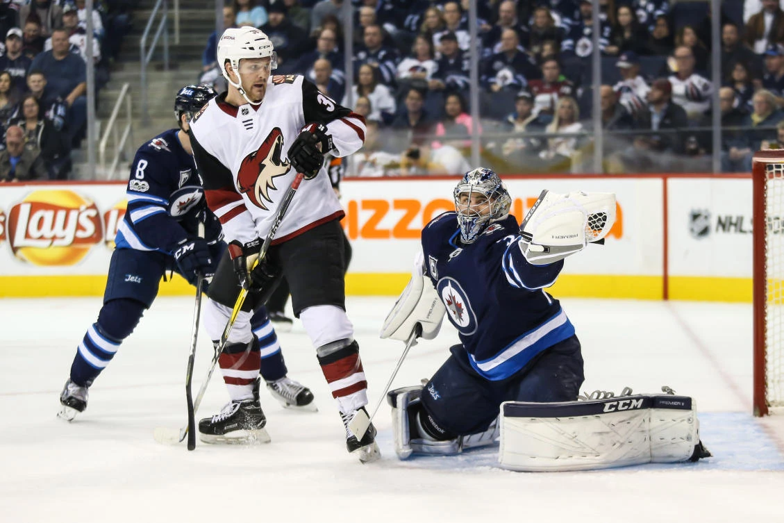 Hellebuyck’s 32 saves lead Jets over Coyotes 4-1