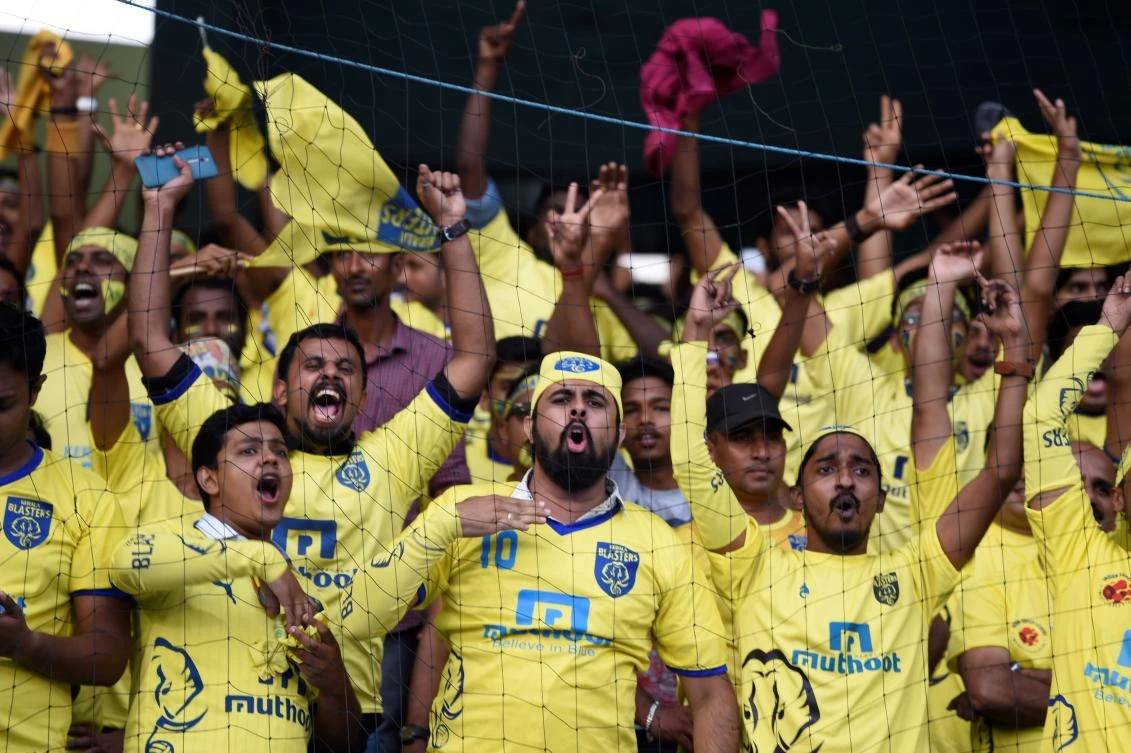 Kerala Blasters FC supporters cheering before the final Indian Super League (ISL) football match Between Kerala Blasters FC and Atletico de Kolkata at the Jawahar Lal Nehru Stadium in Kochi. The Indian Super League has slashed the number of high-earning foreign stars for its new season starting Friday but foreign coaches, including ex-England heroes Teddy Sheringham and Steve Coppell, will be in charge of every team. (AFP/Sajjad Hussain)