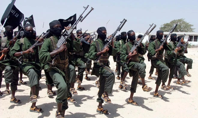 File photo: Hundreds of newly trained Al-Shabab fighters perform military exercises in the Lafofe area some 18 km south of Mogadishu, in Somalia. The US carried out airstrikes against the group on Wednesday. (AP)