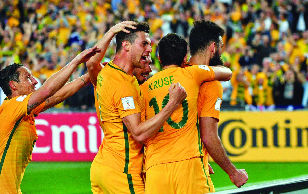 Austrailian players celebrate victory. (AFP)