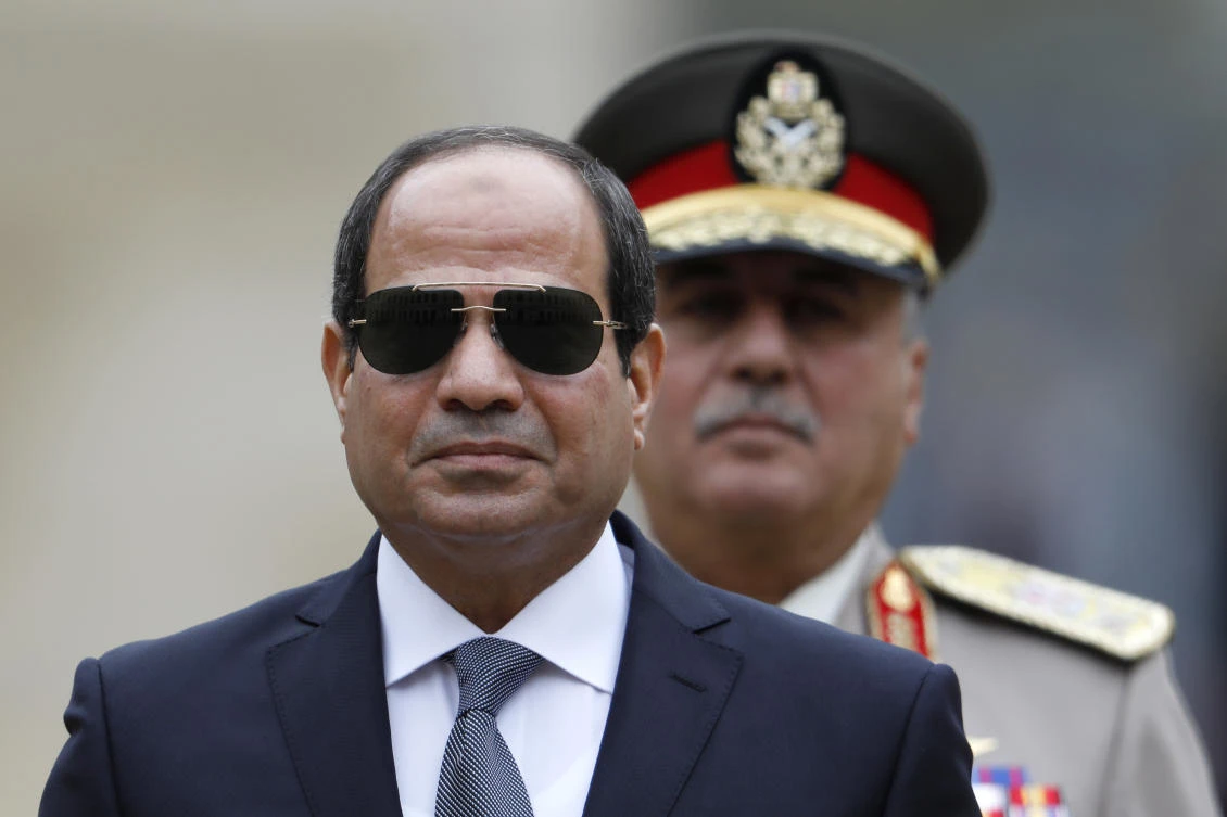 Egyptian President Abdel-Fattah El-Sisi attends a military ceremony in the courtyard at the Hotel des Invalides in Paris, France. (Charles Platiau, Pool via AP, File)
