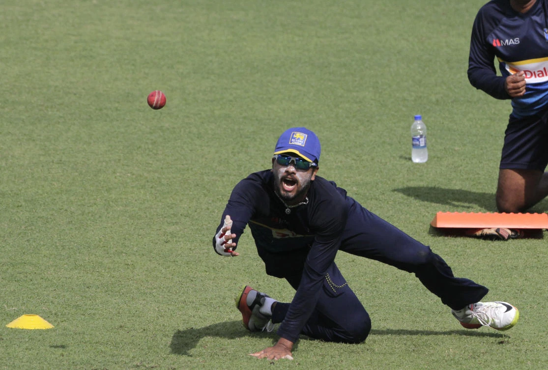 Sri Lanka’s Dinesh Chandimal prepares to catch a ball during a practice session prior to their first cricket test match against India at the Eden Gardens in Kolkata, India, Tuesday, Nov. 14, 2017. Sri Lanka and India are scheduled to play their first test from Nov. 16. (AP/Bikas Das)