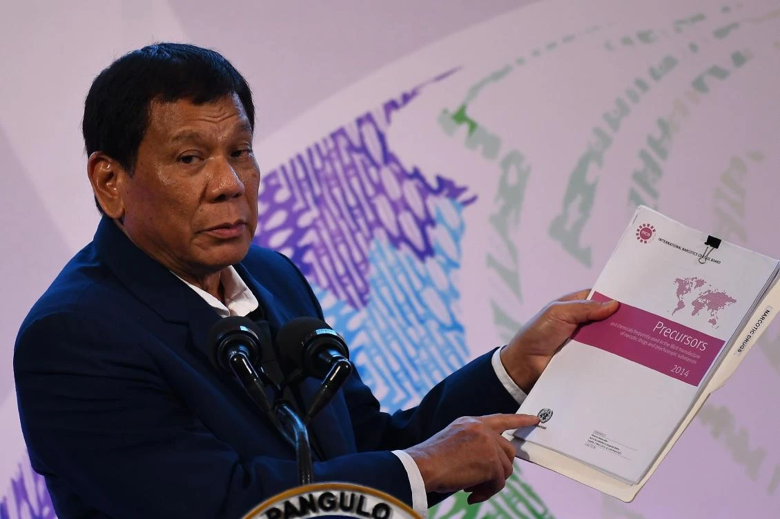 Philippine President Rodrigo Duterte addresses a press conference after the closing ceremony of the 31st Association of Southeast Asian Nations on November 14. Duterte has made it a policy priority to increase public spending on pay hikes for government personnel. (AFP)
